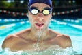 Athlete man, swimming pool and fitness with splash, speed or exercise for wellness, health or sport. Swimmer, closeup Royalty Free Stock Photo