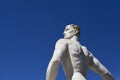 Athlete Marble statue portrait against blue sky