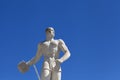 Athlete Marble statue portrait against blue sky