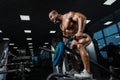 Athlete muscular bodybuilder in the gym training back Royalty Free Stock Photo