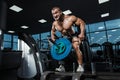 Athlete muscular bodybuilder in the gym training back Royalty Free Stock Photo