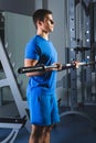 Athlete muscular bodybuilder in the gym training with bar Royalty Free Stock Photo