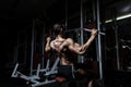 Athlete muscular bodybuilder training in the gym