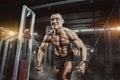 Athlete muscular bodybuilder training on simulator in the gym Royalty Free Stock Photo