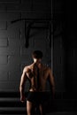 Athlete muscular fitness male model pulling up on horizontal bar Royalty Free Stock Photo