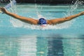 Athlete Performs A Butterfly Stroke Royalty Free Stock Photo