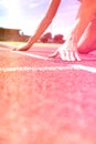 Athlete ready to start relay race Royalty Free Stock Photo