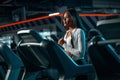 Athlete runner and sprinter, running on treadmill wearing in the sportswear. Fitness and sport motivation. Royalty Free Stock Photo