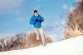 Athlete running on snow, preparing for hard training and workout Royalty Free Stock Photo