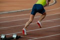 athlete running from start
