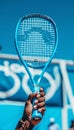 Athlete s hands grasping racket for forehand shot in summer olympic games, emphasizing technique