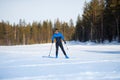 Athlete skier man finishes cross country skiing winter stadium