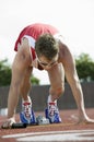 Athlete In Starting Blocks With Baton Royalty Free Stock Photo