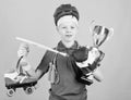 Athlete successful boy sport equipment jump rope boxing glove tennis racket roller skate and golden goblet. Success and Royalty Free Stock Photo