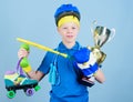 Athlete successful boy sport equipment jump rope boxing glove tennis racket roller skate and golden goblet. Success and Royalty Free Stock Photo