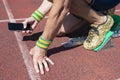 Athlete Using Mobile Phone on the Track Royalty Free Stock Photo