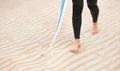 Athlete, walking or feet on beach sand with surfboard on vacation for fitness training, wellness or travel. Legs of Royalty Free Stock Photo