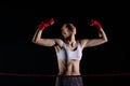 Strong emotions after winning the fight. A young MMA fighter. Hands raised up to prove a huge victory