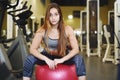 Athlete young woman doing exercise at gym. Royalty Free Stock Photo