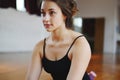 Athlete young woman doing exercise at gym. Indoors. Royalty Free Stock Photo