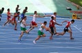 Athletes on the 4 x 100 meters relay race