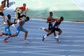 Athletes on the 4 x 100 meters relay race Royalty Free Stock Photo