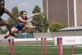 Athletes Clearing Hurdles In Race Royalty Free Stock Photo