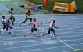 Athletes compete in the 4x100 relay race Royalty Free Stock Photo