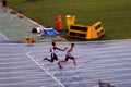 Athletes compete in the 4x100 relay race Royalty Free Stock Photo
