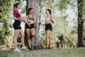 Athletes Enjoying a Sunny Day in the City Park After Training Royalty Free Stock Photo