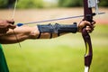 Athletes hand practicing archery