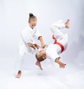 Athletes in judogi are training throws Royalty Free Stock Photo