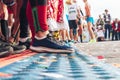 Athletes legs close-up in front of the start line Royalty Free Stock Photo