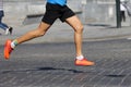 Athletes run marathons on the pavement Royalty Free Stock Photo
