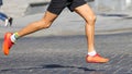 Athletes run marathons on the pavement
