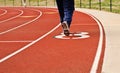 Athletes running on synthetic track