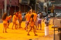 Athletes are seen covered in orange powder during a colorful race at Dique do Tororo in the city of Salvador, Bahia