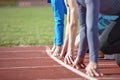 Athletes at the sprint start line in track and field Royalty Free Stock Photo