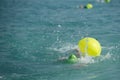 Athletes swimming free style in the sea during triathlon competition. Swimmer in the ocean