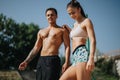 Active Couple Engaging in Outdoor Fitness Training in a Sunny Park