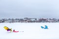 The athletes in the winter is preparing a kites for Snowkiting