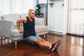 Athletic and active senior man using furniture for pushup. Clout