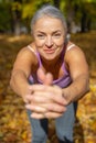 Athletic beautiful lady smiling at the camera