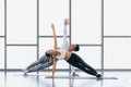 Athletic couple workout  with planking together in gym and fitness center Royalty Free Stock Photo