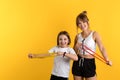 Mom and daughter workouts in studio Royalty Free Stock Photo