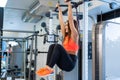 Athletic fitness sexy girl pulls up on bar in gym Royalty Free Stock Photo