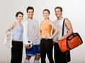 Athletic friends in sportswear with soccer ball