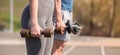 Athletic guy and girl doing exercises with dumbbells at the sports field Royalty Free Stock Photo
