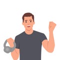 Athletic male lifting kettlebell demonstrate power