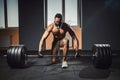 African american athletic man waiting and preparing before lifting heavy barbell looking at camera. fitness, sport, training, gym Royalty Free Stock Photo